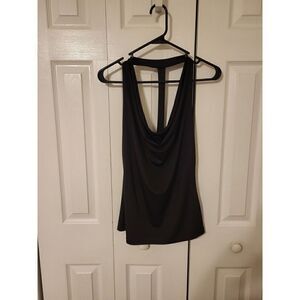Black haulter top with extra hanging material at bust